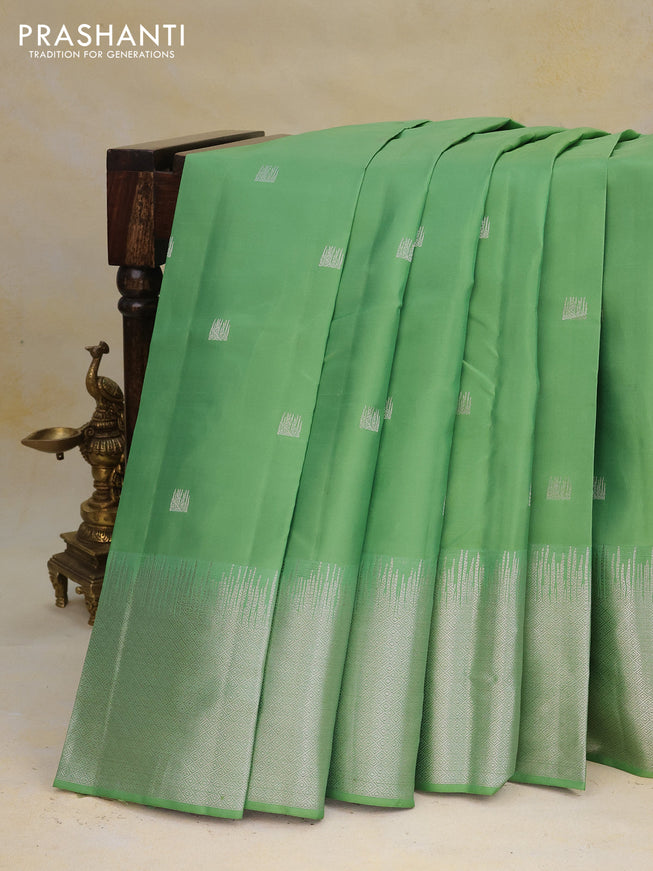 Pure kanchipuram silk saree pastel green with silver zari woven buttas and long silver zari woven border