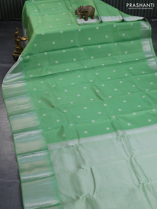 Pure kanchipuram silk saree pastel green with silver zari woven buttas and long silver zari woven border