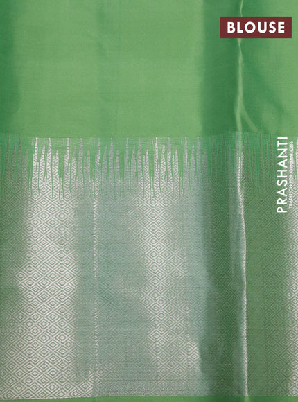 Pure kanchipuram silk saree pastel green with silver zari woven buttas and long silver zari woven border