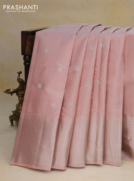 Pure kanchipuram silk saree pastel peach shade with silver zari woven buttas and long silver zari woven border