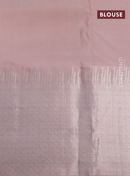 Pure kanchipuram silk saree pastel peach shade with silver zari woven buttas and long silver zari woven border