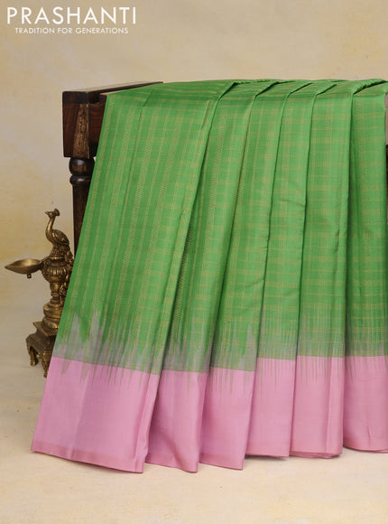 Pure kanchipuram silk saree pastel green and pastel pink with allover zari checked pattern and simple border