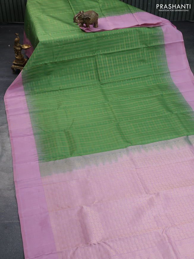 Pure kanchipuram silk saree pastel green and pastel pink with allover zari checked pattern and simple border