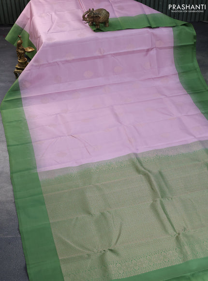 Pure kanchipuram silk saree pastel pink and sap green with zari woven buttas and simple border