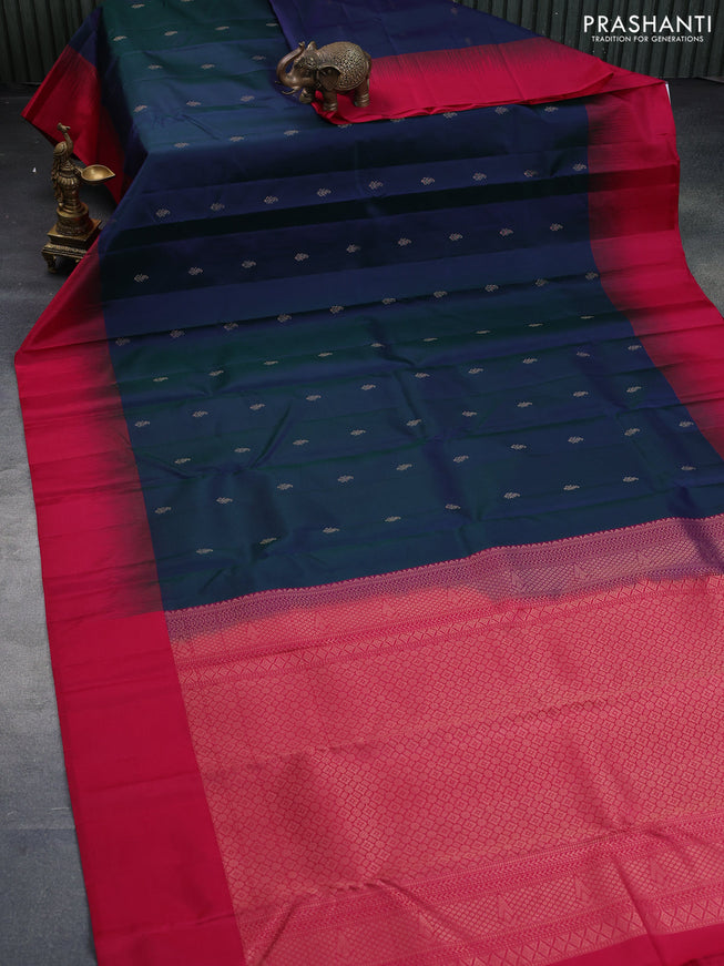 Pure kanchipuram silk saree dual shade of bluish green and pink with allover zari woven buttas and simple border