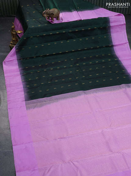 Pure kanchipuram silk saree bottle green and lotus pink with zari woven buttas and simple border