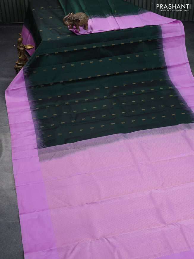 Pure kanchipuram silk saree bottle green and lotus pink with zari woven buttas and simple border