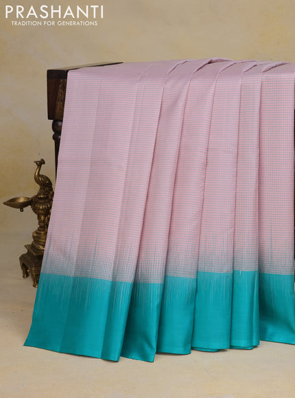 Pure kanchipuram silk saree pastel pink and teal green with allover zari checked pattern and simple border