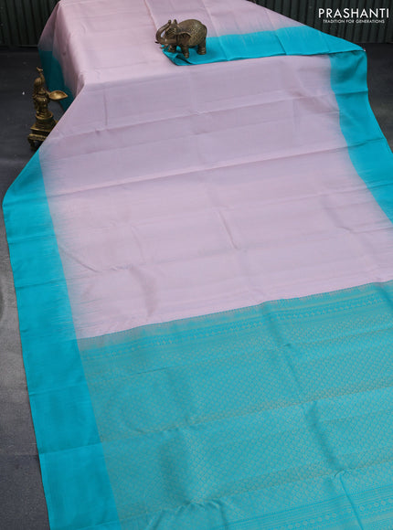 Pure kanchipuram silk saree pastel pink and teal green with allover zari checked pattern and simple border