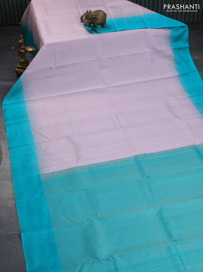 Pure kanchipuram silk saree pastel pink and teal green with allover zari checked pattern and simple border