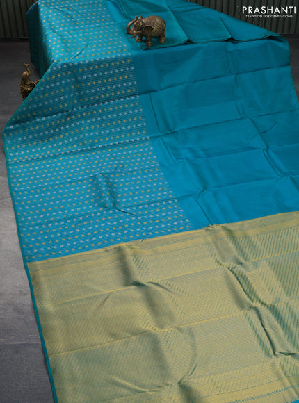 Pure kanchipuram silk saree dual shade of teal bluish green with half & half style buttas in borderless style