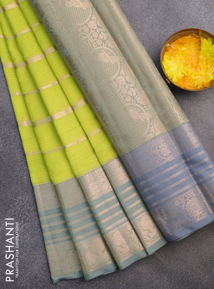 Cotton zari kota saree lime green and grey with allover zari woven stripes pattern and long zari woven border