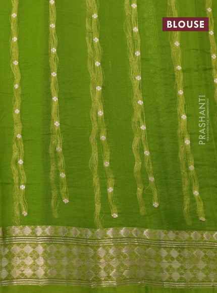 Poona silk saree mehendi green with allover zari stripe & buttas and zari woven border