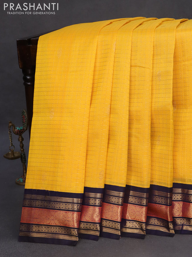 Kuppadam silk cotton saree yellow and navy blue with allover zari checks & buttas and zari woven korvai border