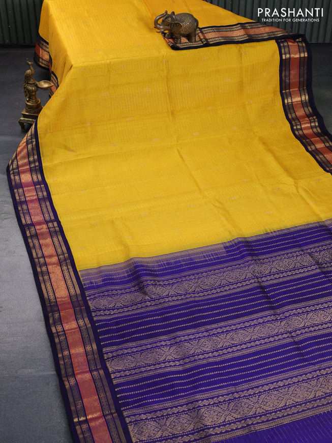 Kuppadam silk cotton saree yellow and navy blue with allover zari checks & buttas and zari woven korvai border