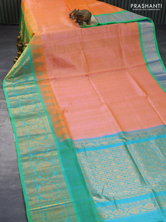 Kuppadam silk cotton saree dual shade of peach shade and dual shade of teal green with zari woven checks & buttas and long rich zari woven border