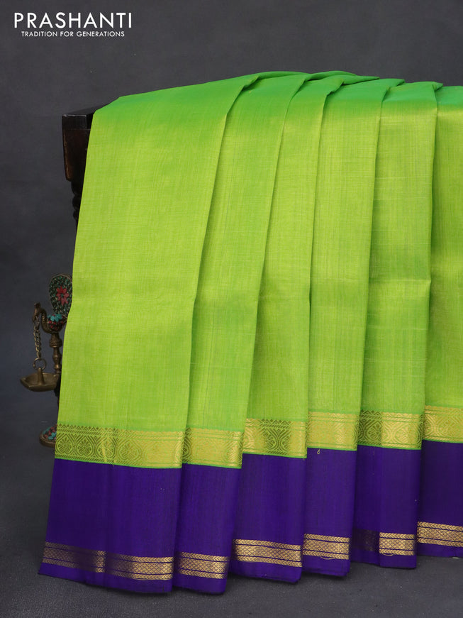 Kuppadam silk cotton saree light green and blue with plain body and rettapet zari woven border