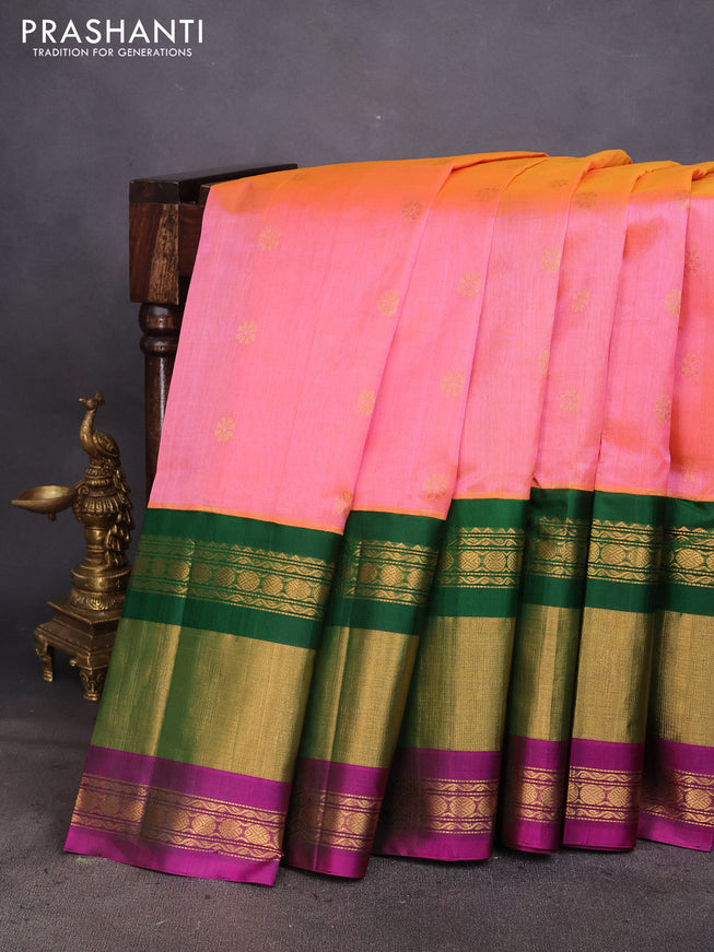 Kuppadam silk cotton saree dual shade of pinkish yellow and green with zari woven floral buttas and long zari woven border