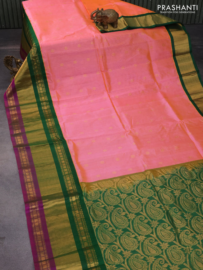 Kuppadam silk cotton saree dual shade of pinkish yellow and green with zari woven floral buttas and long zari woven border