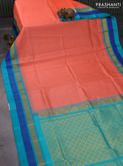 Kuppadam silk cotton saree peach shade and teal blue with plain body and temple design zari woven border