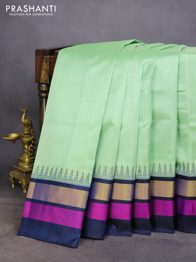 Kuppadam silk cotton saree pastel green and dark peacock blue with plain body and temple design zari woven border