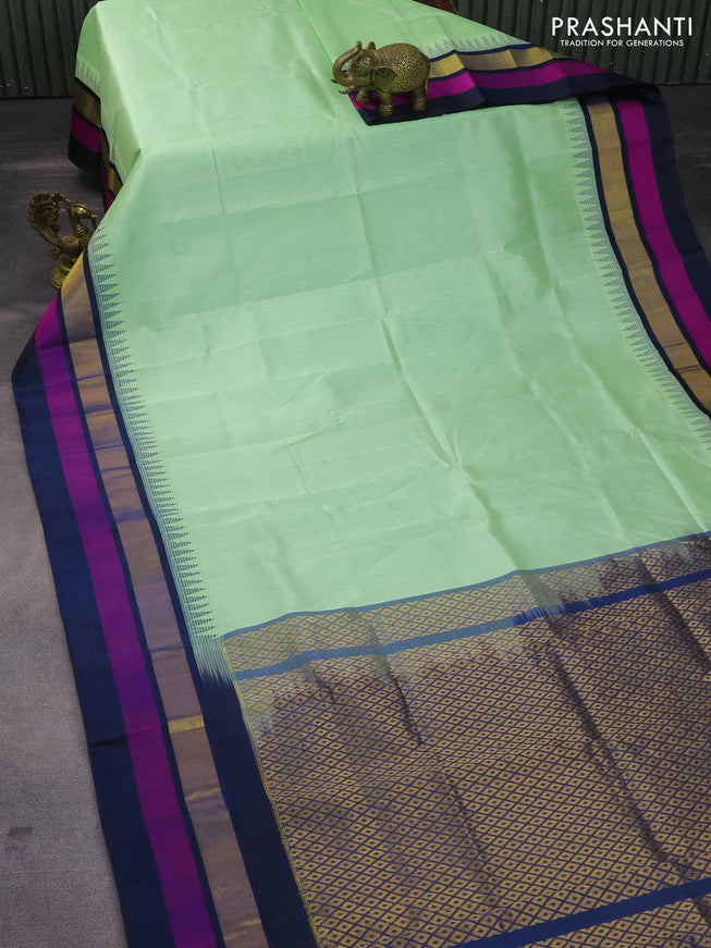 Kuppadam silk cotton saree pastel green and dark peacock blue with plain body and temple design zari woven border