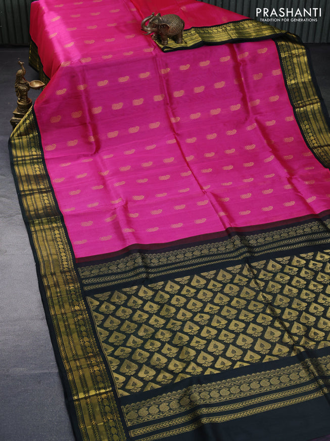 Kuppadam silk cotton saree pink and bottle green with allover zari woven paisley buttas and zari woven border