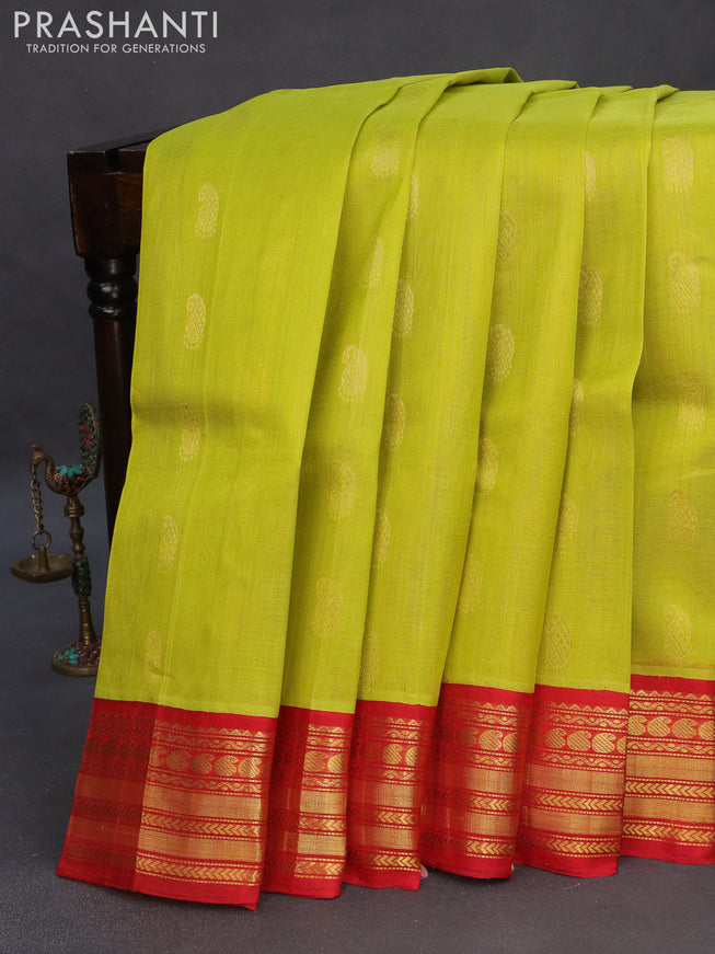 Kuppadam silk cotton saree lime yellow and red with allover zari woven paisley buttas and zari woven border