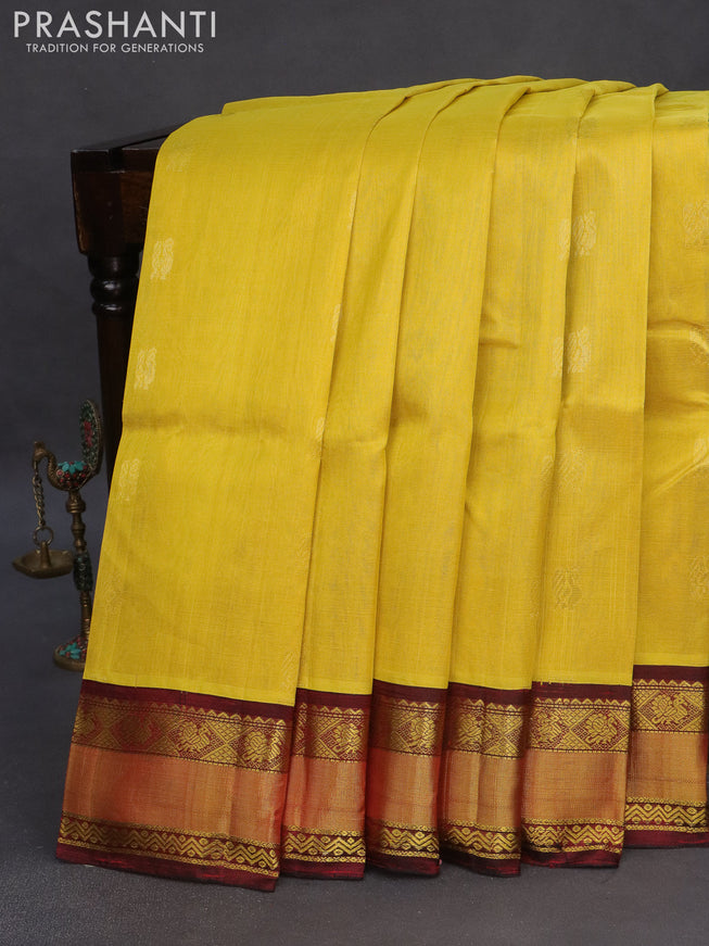 Kuppadam silk cotton saree lime yellow and maroon with zari woven annam buttas and zari woven border