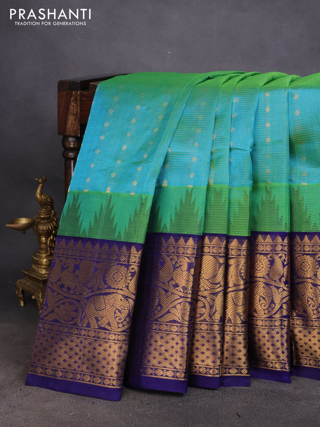 Kuppadam silk cotton saree dual shade of teal blue and blue with zari woven checks & buttas and long zari woven border