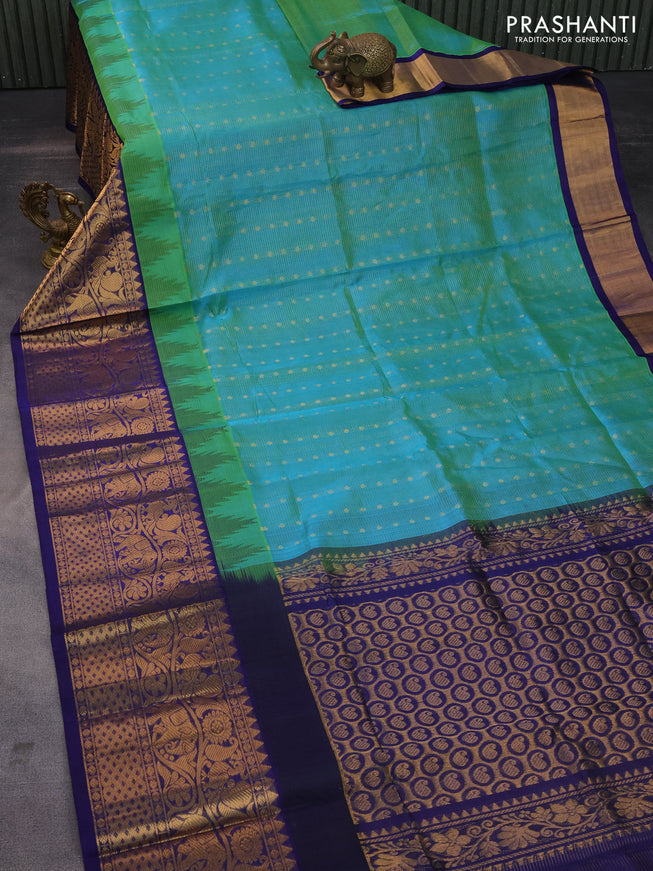 Kuppadam silk cotton saree dual shade of teal blue and blue with zari woven checks & buttas and long zari woven border