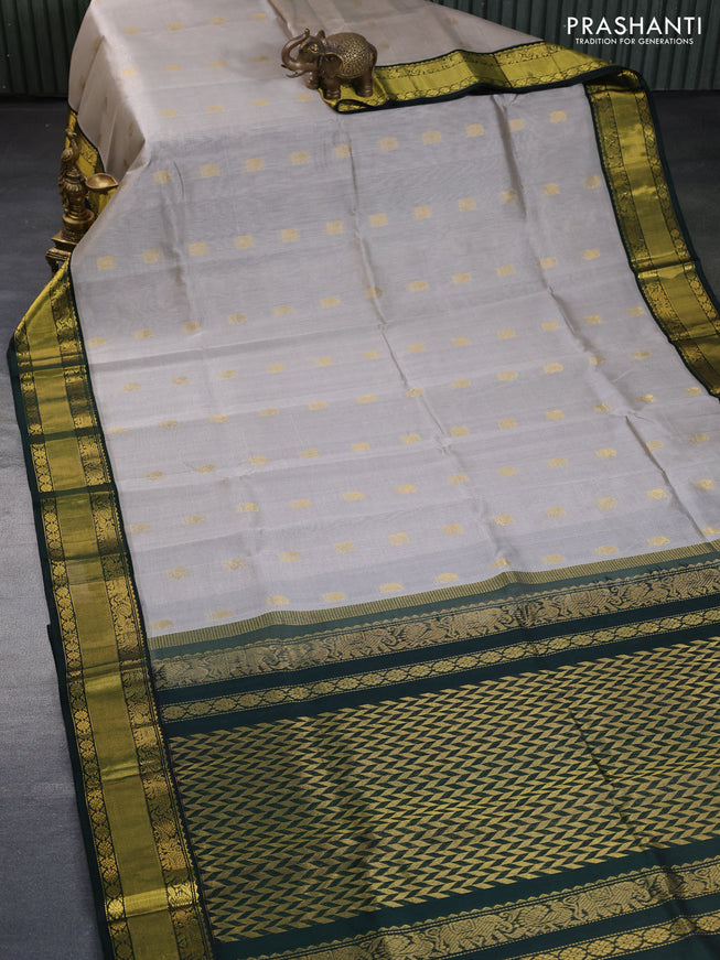 Kuppadam silk cotton saree grey and bottle green with allover zari woven buttas and zari woven border