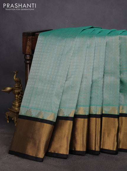 Kuppadam silk cotton saree teal green shade and black with zari woven checks & buttas and long temple design zari woven border