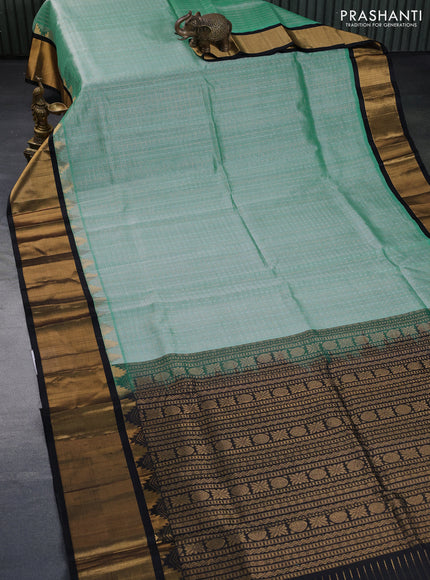 Kuppadam silk cotton saree teal green shade and black with zari woven checks & buttas and long temple design zari woven border