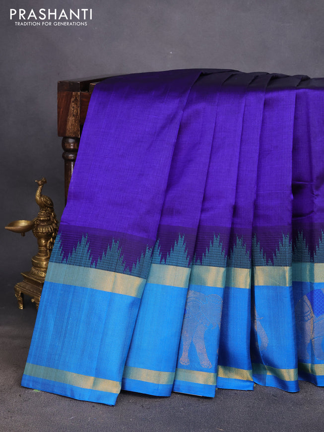 Kuppadam silk cotton saree blue and cs blue with plain body and temple design rettapet zari woven elephant butta border