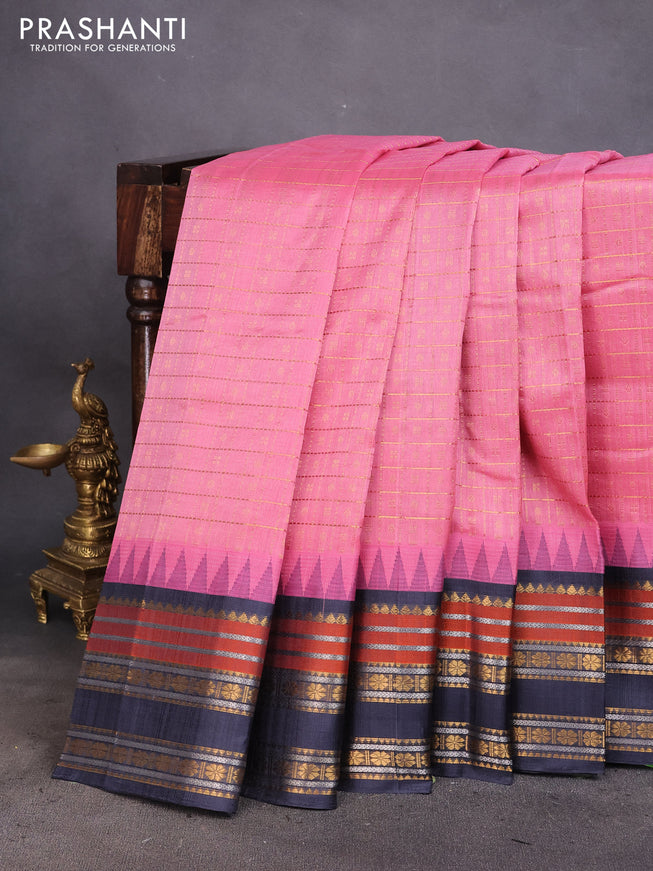 Kuppadam silk cotton saree peach pink and dark grey with zari woven checks & buttas and temple design zari woven border