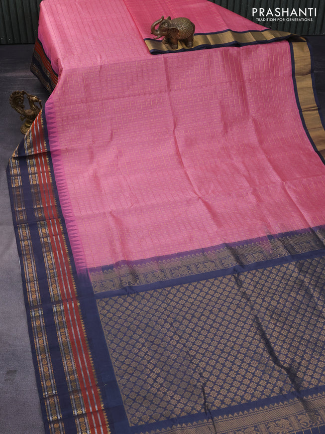 Kuppadam silk cotton saree peach pink and dark grey with zari woven checks & buttas and temple design zari woven border