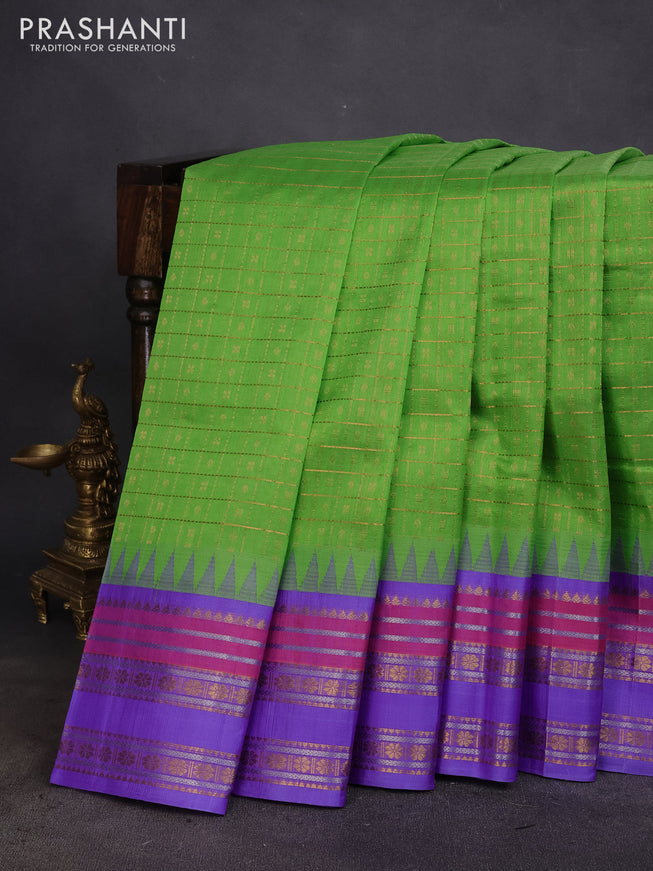 Kuppadam silk cotton saree light green and lavender with zari woven checks & buttas and temple design zari woven border