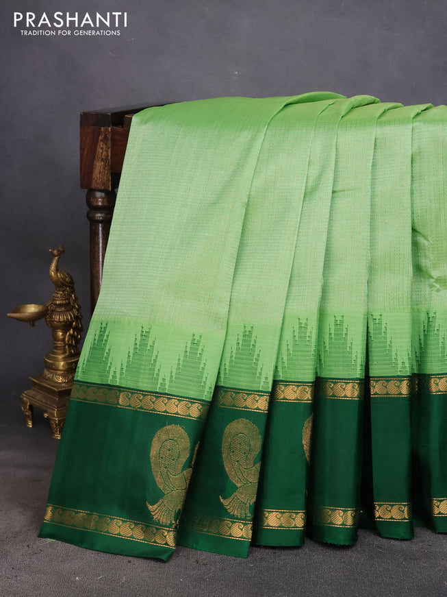 Kuppadam silk cotton saree patel green and green with allover zari checked pattern and temple design rettapet zari woven annam butta border