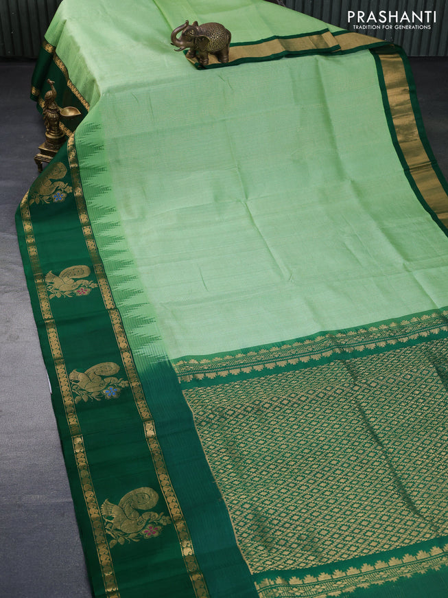 Kuppadam silk cotton saree patel green and green with allover zari checked pattern and temple design rettapet zari woven annam butta border