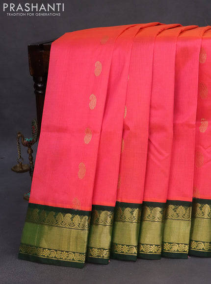 Kuppadam silk cotton saree dual shade of pink and dark green with allover zari woven buttas and zari woven border