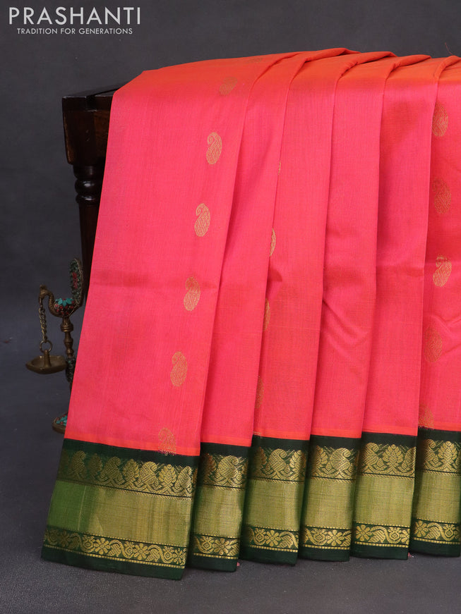 Kuppadam silk cotton saree dual shade of pink and dark green with allover zari woven buttas and zari woven border