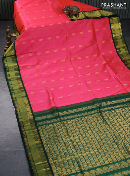 Kuppadam silk cotton saree dual shade of pink and dark green with allover zari woven buttas and zari woven border