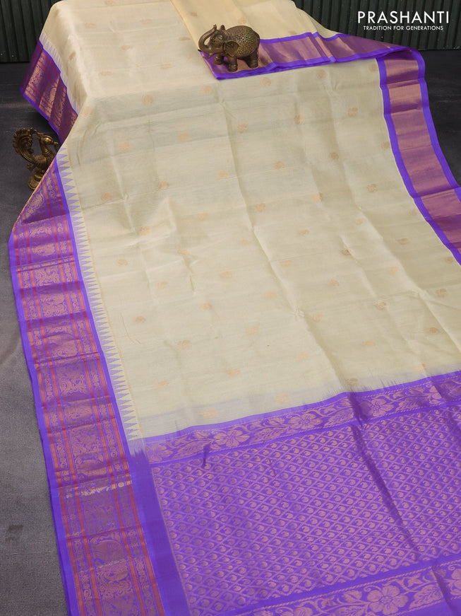 Kuppadam silk cotton saree cream and lavender with zari woven checks & buttas and temple design zari woven border