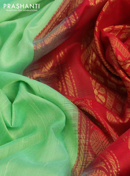 Kuppadam silk cotton saree teal shade shade and red with plain body and long zari woven border