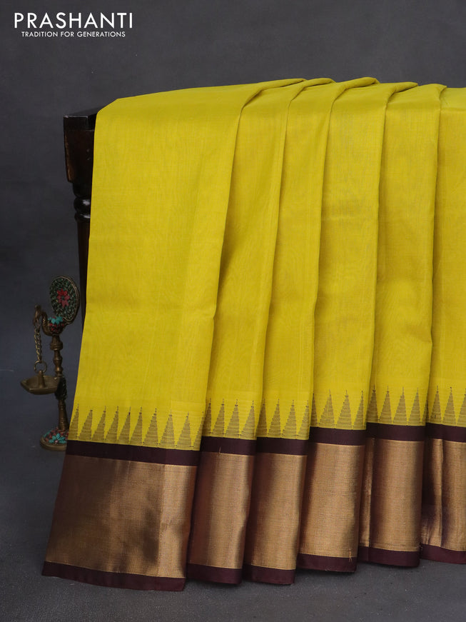 Kuppadam silk cotton saree lime yellow and deep jamun shade with plain body and zari woven border