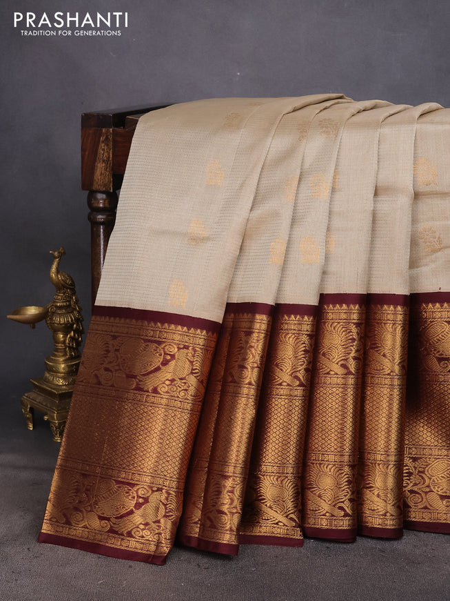 Kuppadam silk cotton saree beige and deep coffee brown with zari woven checks & buttas and long zari woven border