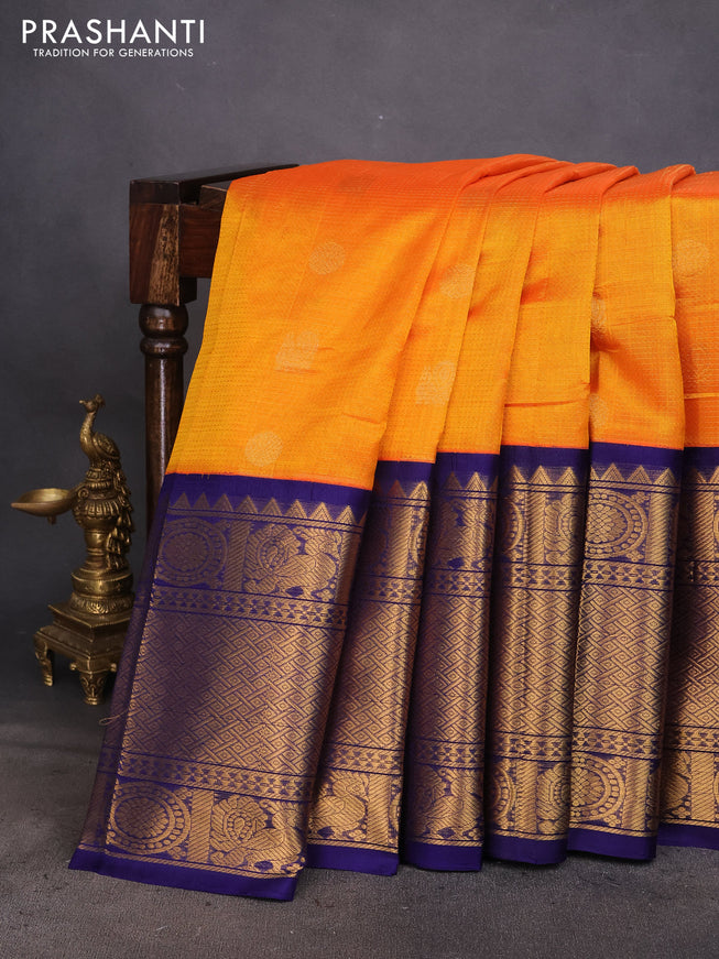 Kuppadam silk cotton saree orange and blue with zari woven checks & buttas and long zari woven border