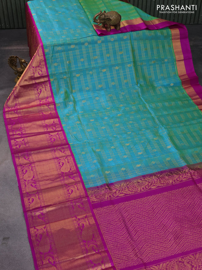 Kuppadam silk cotton saree dual shade of teal bluish green and purple with zari woven checks & buttas and long zari woven border