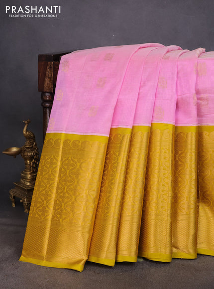 Kuppadam silk cotton saree baby pink and yellow with zari woven checks & buttas and long zari woven border